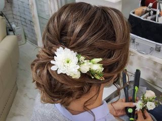 A Person With Flowers In The Hair